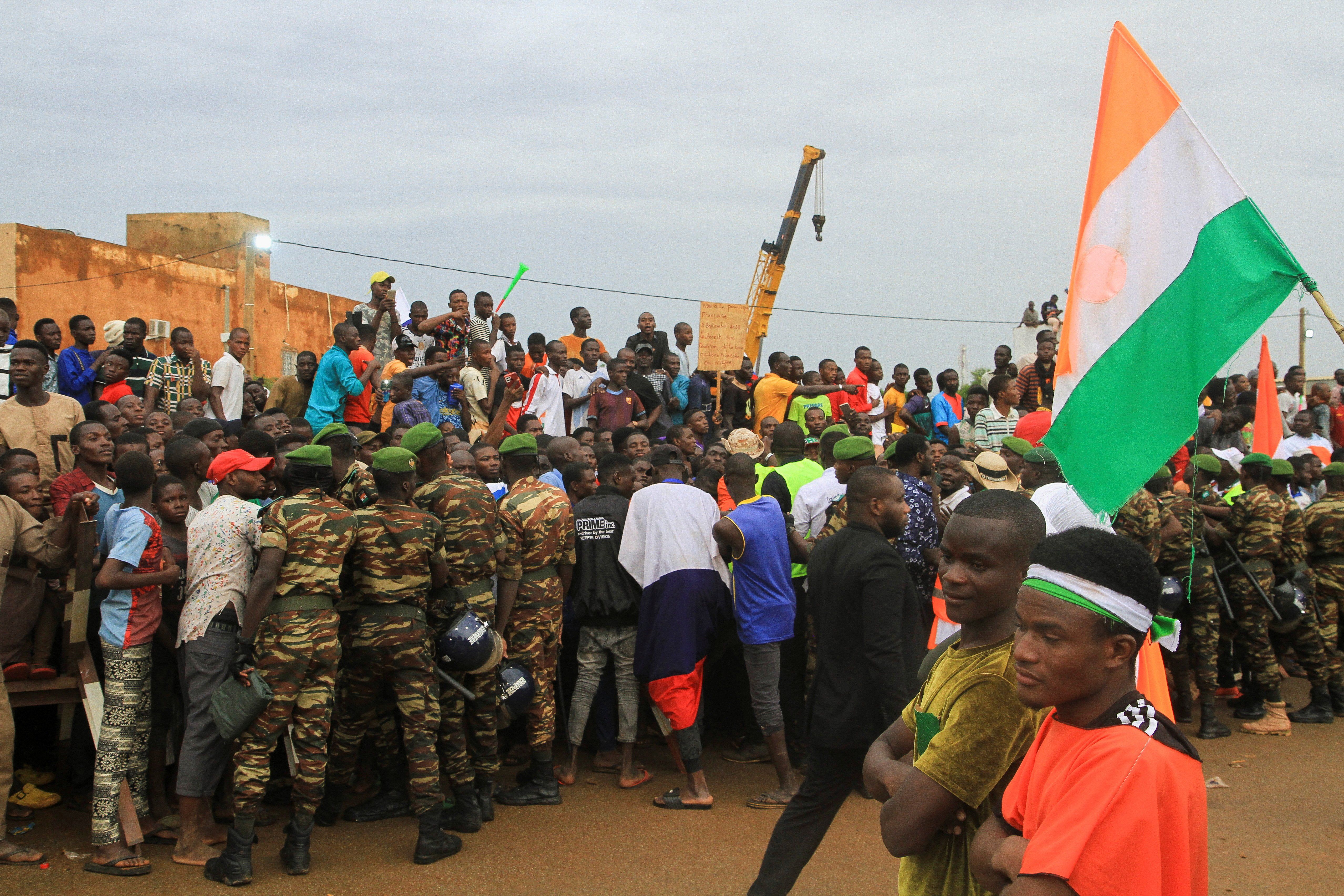 Thousands of Nigeriens gather in front of the French army headquarter, in support of the putschist soldiers and to demand the French army to leave, in Niamey, Niger.