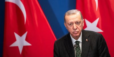 Turkish President Recep Tayyip Erdogan, speaks during a press conference in Budapest.