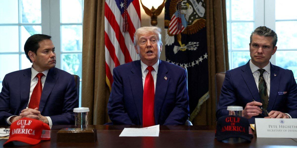 ​U.S. President Donald Trump speaks next to U.S. Defense Secretary Pete Hegseth and U.S. Secretary of State Marco Rubio during a cabinet meeting at the White House in Washington, D.C., U.S., April 30, 2025. 