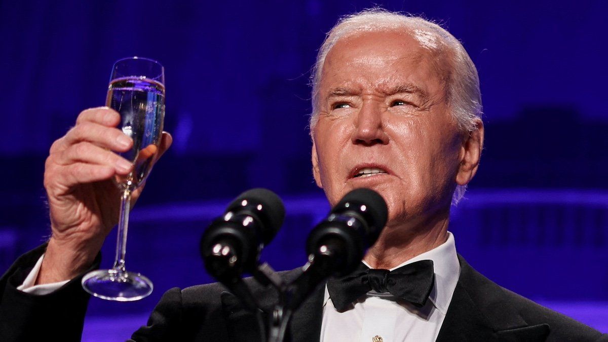 ​U.S. President Joe Biden raises a toast during the White House Correspondents' Association Dinner in Washington, U.S., April 27, 2024. 
