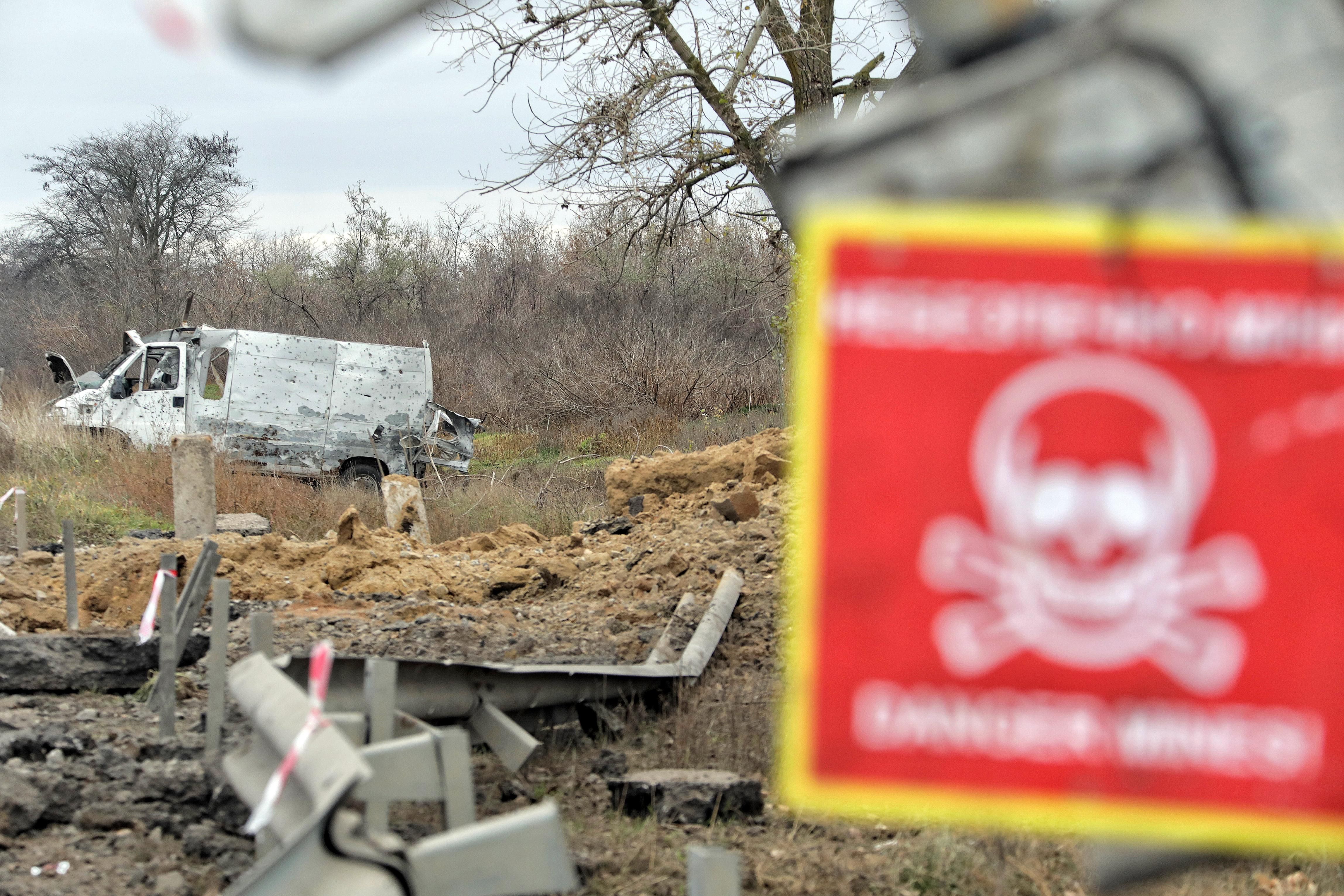 Ukrainian soldiers clear mines in a part of the southern Kherson region liberated from Russia.