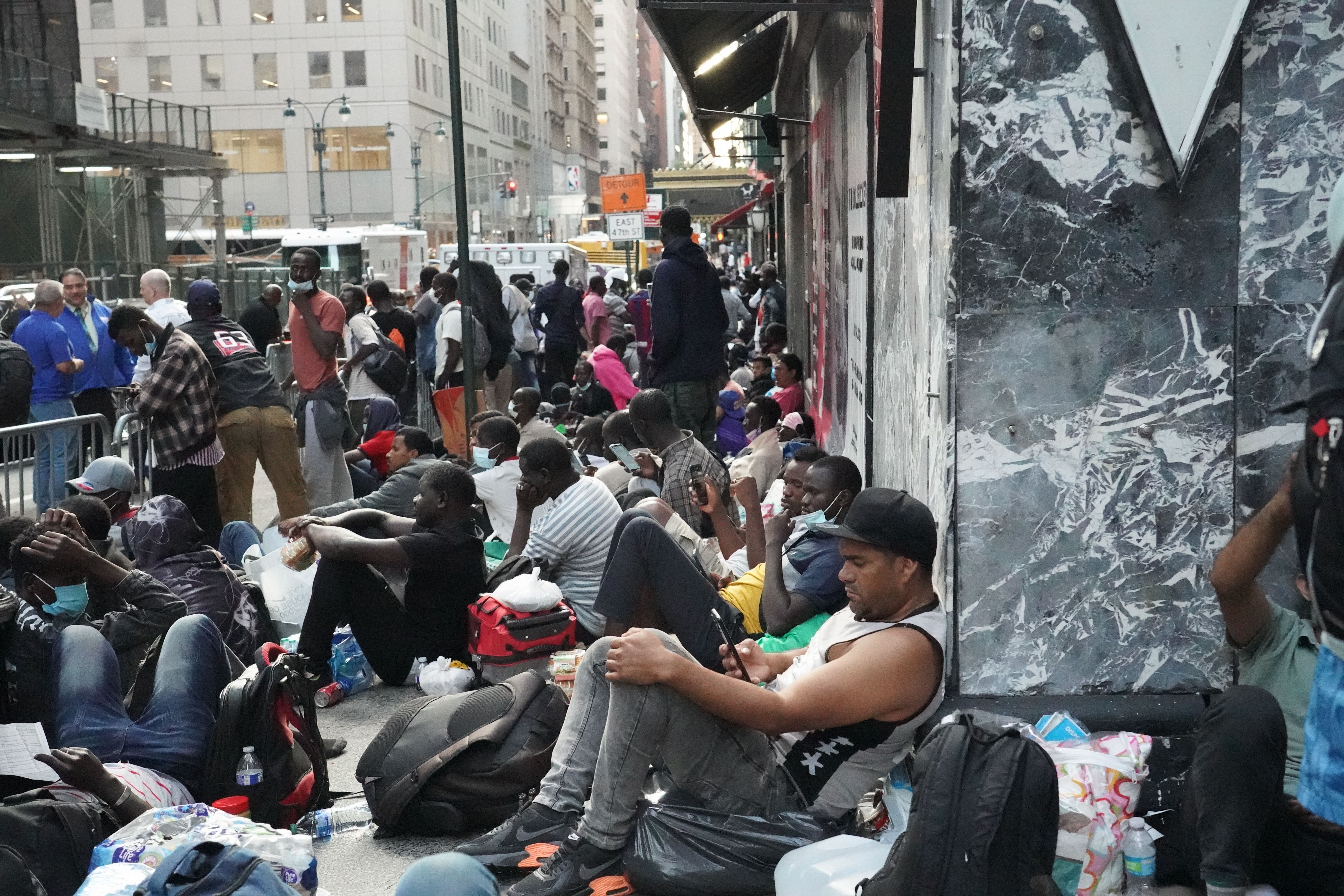 Undocumented Immigrants from West Africa, Mexico, and Venezuela camp outside the Roosevelt Hotel in New York City.