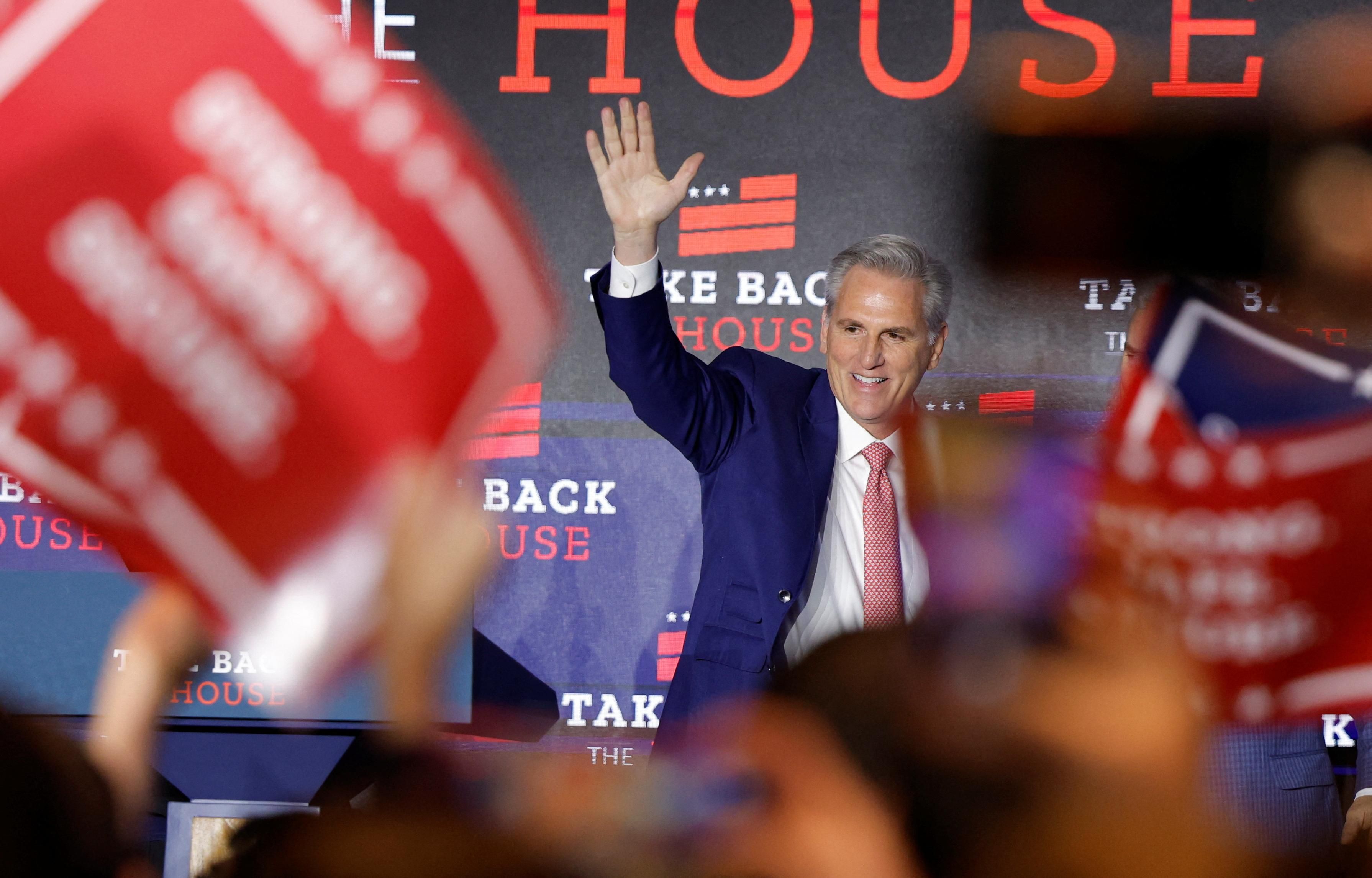 US House Republican Leader Kevin McCarthy (R-CA) waves after speaking to supporters on midterms election night.