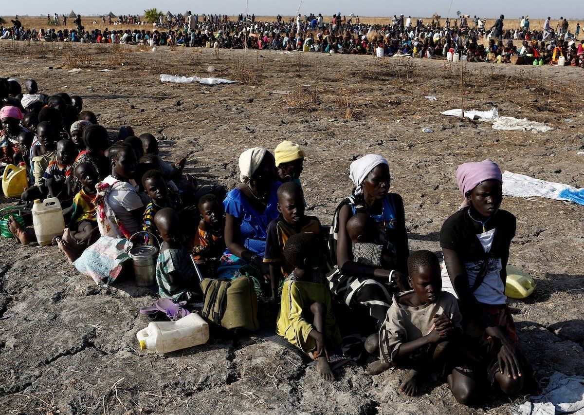 Women and children wait for food distribution from the United Nations World Food Programme in Thonyor, Leer state, South Sudan, back in 2017. 