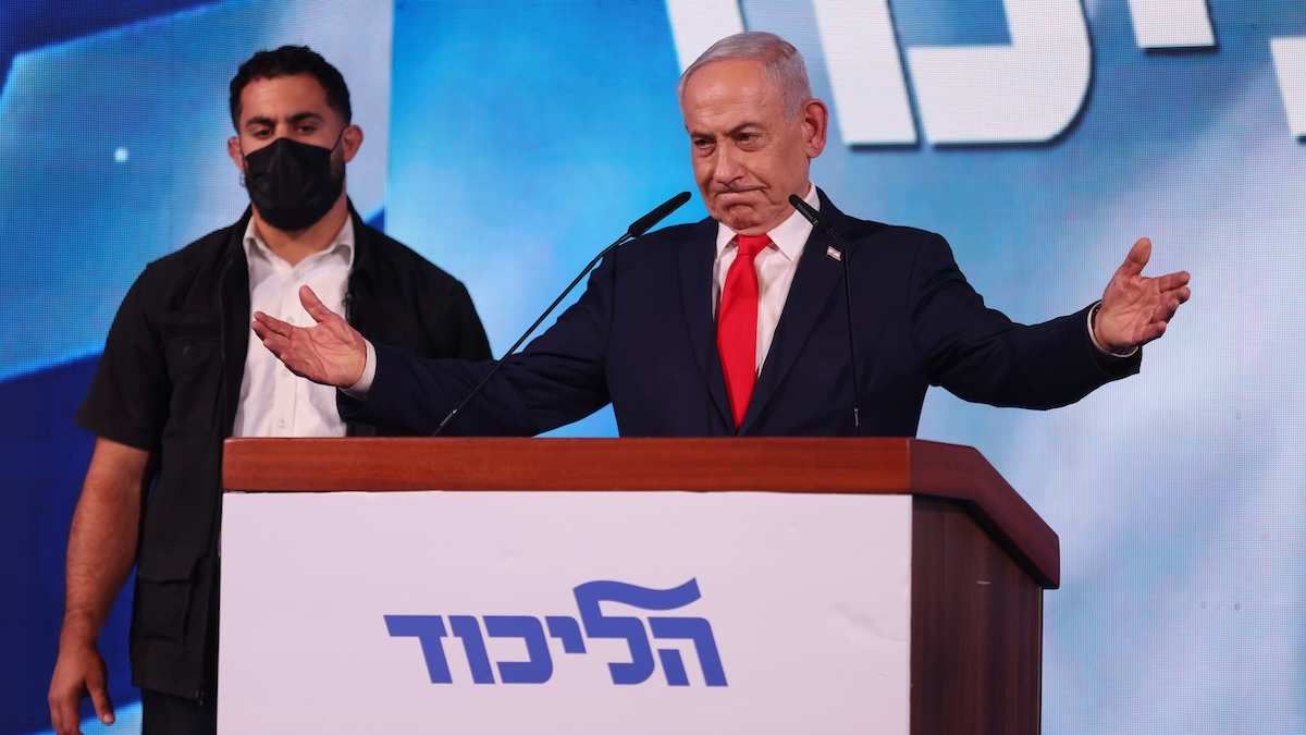 Likud Party leader and Israeli Prime Minister Benjamin Netanyahu delivers a speech to supporters at the Likud campaign headquarters following the release of exit polls and initial results of the general election in Jerusalem on October 28, 2026.