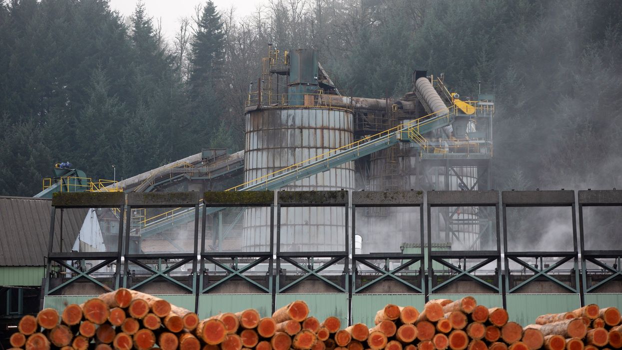Logs and lumber are stored at one of the Freres Lumber facilities in Lyons, Oregon,