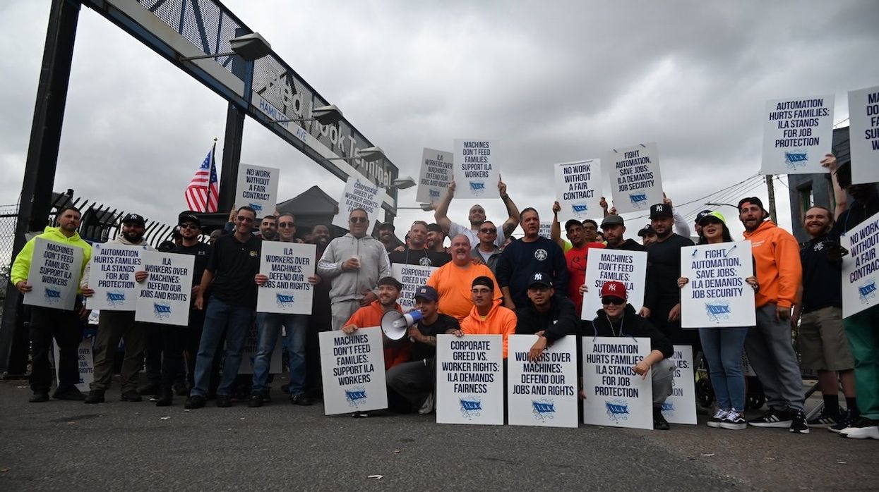 Longshoremen carry signs and demonstrate to make their voices heard outside Red Hook Terminal in Brooklyn, New York, on Oct. 2, 2024.