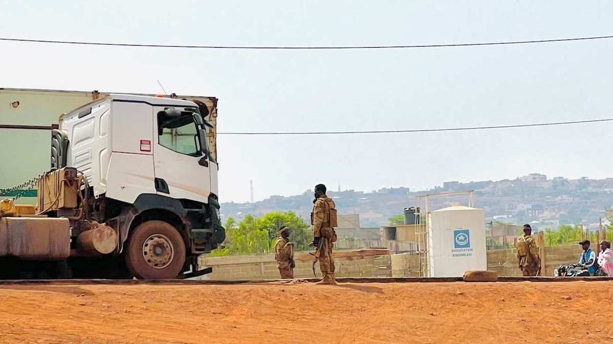 Malian soldiers stand near a truck during a patrol following the attack on Mali's main military base in Kati, Mali, on April 27, 2026.