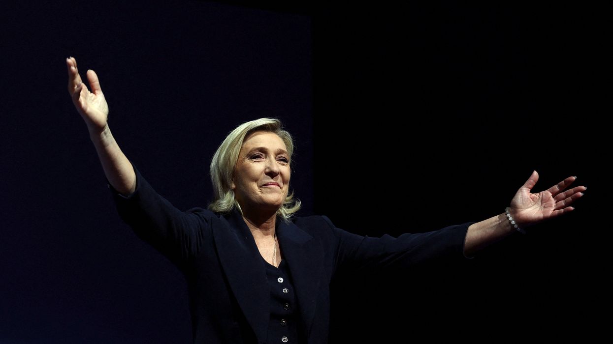 Marine Le Pen, French far-right leader and far-right Rassemblement National (National Rally - RN) party candidate, reacts on stage after partial results in the first round of the early French parliamentary elections in Henin-Beaumont, France, June 30, 2024.