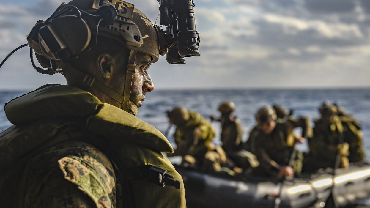 Marines conduct combat rubber raiding craft operations from the well deck of the USS Green Bay in the Philippine Sea, Feb. 6, 2022. The US commander-in-chief said on Feb 22, 2022 he had authorised the movement of additional forces and equipment to bolster NATO allies Estonia, Latvia and Lithuania as Russian troops being ordered to eastern Ukraine following Vladimir Putin recognition of the independence of two separatist regions.