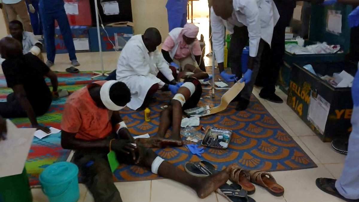 Medical workers treat injured people at Ameth Bek hospital after a drone strike on a market in the disputed Abyei region along the border between South Sudan and Sudan, October 19, 2026.