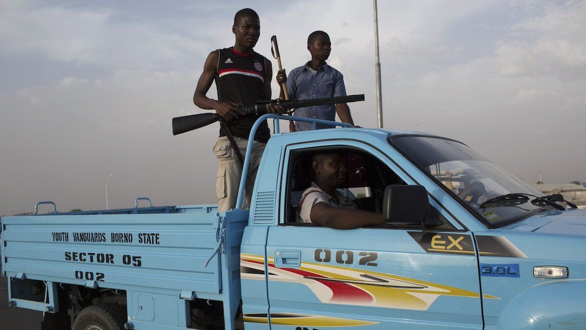 ​Members of civilian joint task force patrol in Maiduguri May 22, 2014. Civilian joint task force are government-sponsored civilian self-defence and community-policing groups within Borno state that some locals said have brought security to Maiduguri, according to local government officials. 