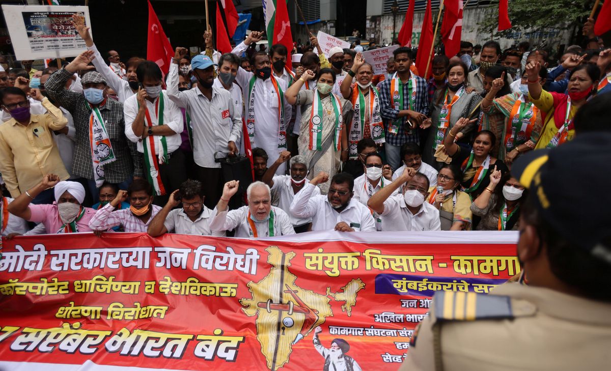 Members of the Communist Party of India (CPI) protest against farm laws during a nationwide strike, in Mumbai, India, September 27, 2021