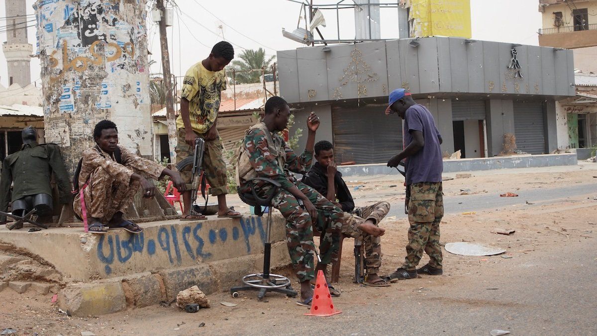 Members of the Sudanese Armed Forces gather on the street, almost one year into the war between the Sudanese Armed Forces and the paramilitary Rapid Support Forces (RSF), in Omdurman, Sudan, April 7, 2024