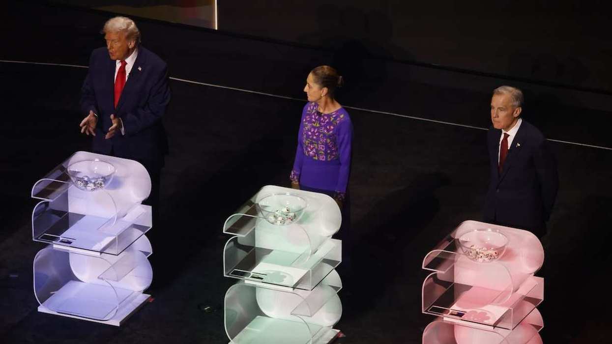 Mexican President Claudia Sheinbaum Pardo, Canadian Prime Minister Mark Carney, and US President Donald Trump during the 2026 World Cup draw in Washington, D.C., on December 5, 2025.