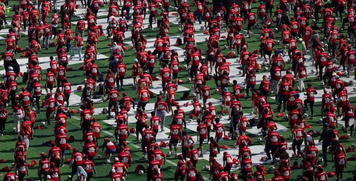 ​Mexicans participate in an attempt to set a new Guinness World Record, where organisers aim to break the mark for the world's largest football (soccer) lesson as part of efforts to promote the country ahead of the 2026 FIFA World Cup, at Zocalo square in Mexico City, Mexico, March 15, 2026. 
