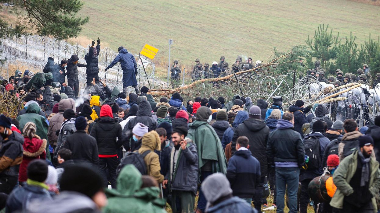 Migrants are seen on the Belarusian-Polish border. Nearly 1,000 refugees were heading towards the Polish border in the morning of November 8, 2021.