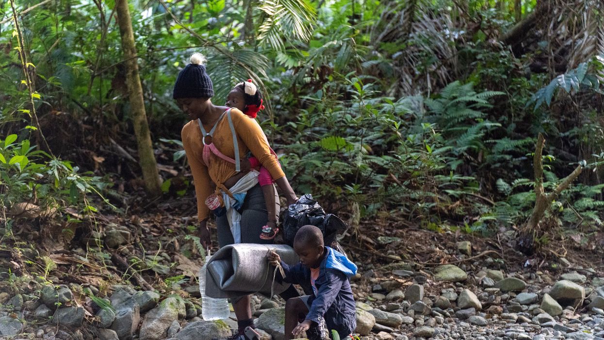 Migrants trek through the Darien Gap towards the border with Panama.