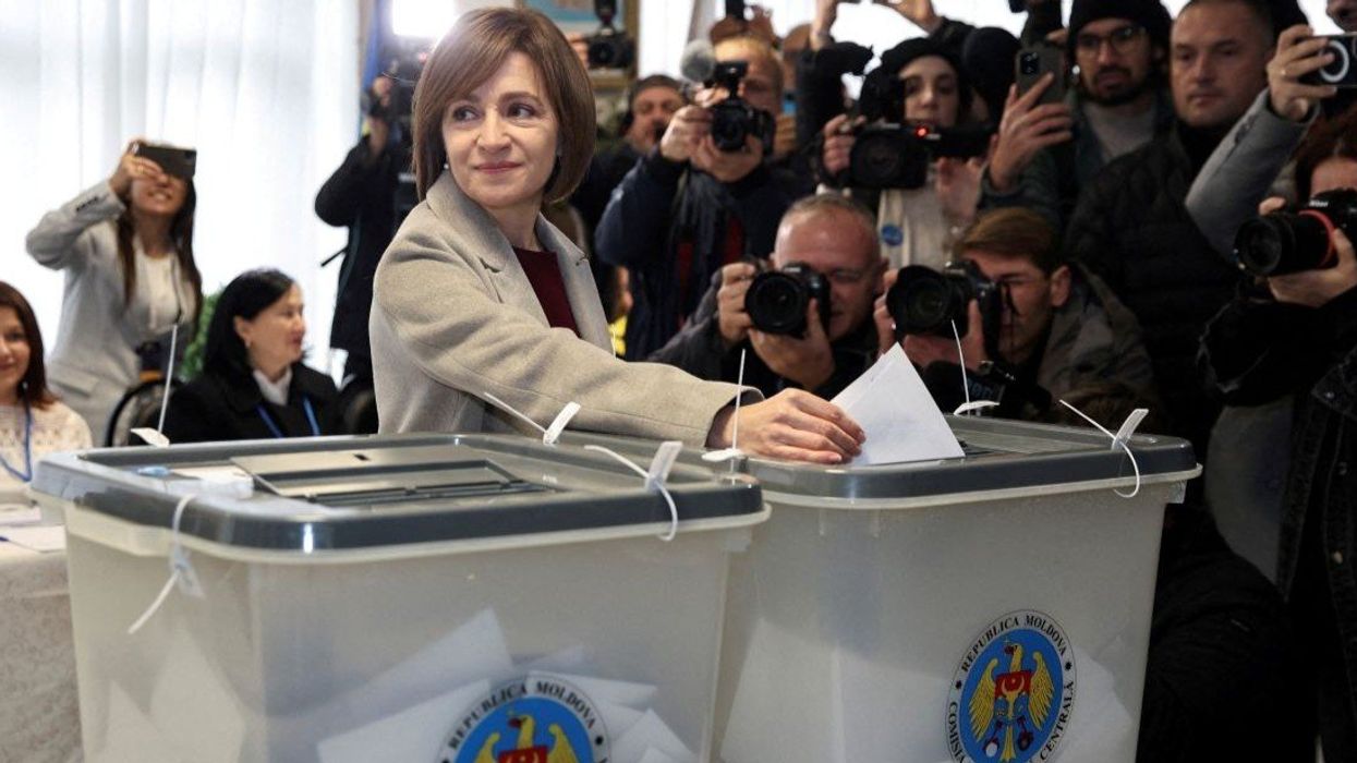 Moldova's incumbent President and presidential candidate Maia Sandu casts her ballots at a polling station, as the country holds a presidential election and a referendum on joining the European Union, in Chisinau, Moldova October 20, 2024.