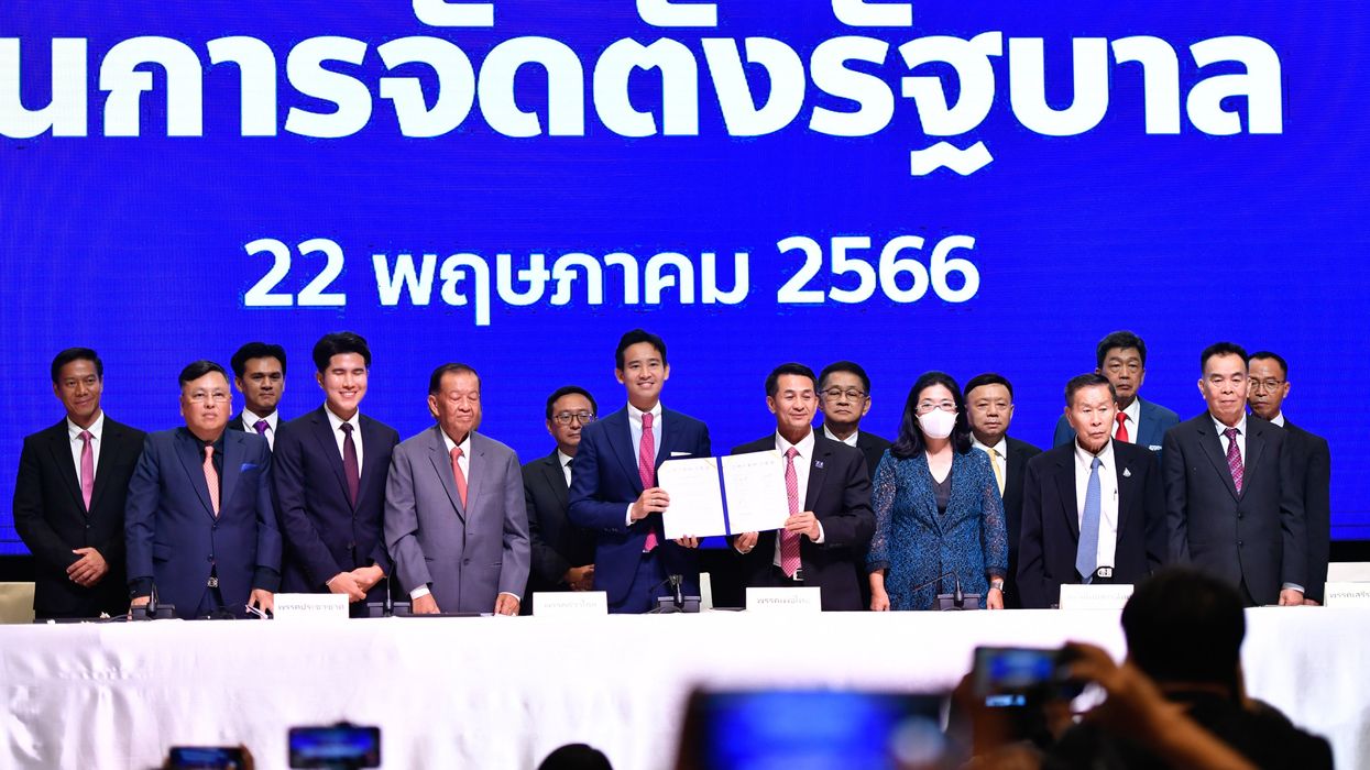 Move Forward Party, Pheu Thai party, and coalition partner leaders sign an MOU in Bangkok, Thailand.