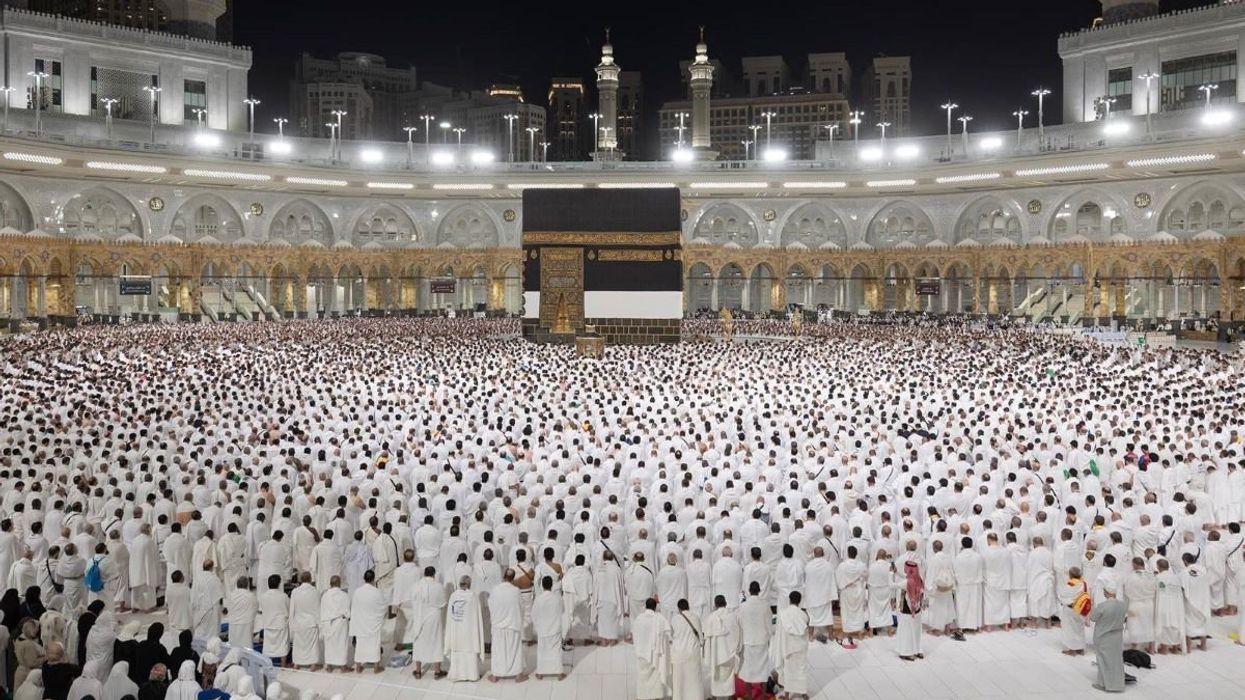 Muslim pilgrims perform the dawn prayer around the Kaaba, Islam s holiest shrine, at the Grand Mosque complex in Mecca.