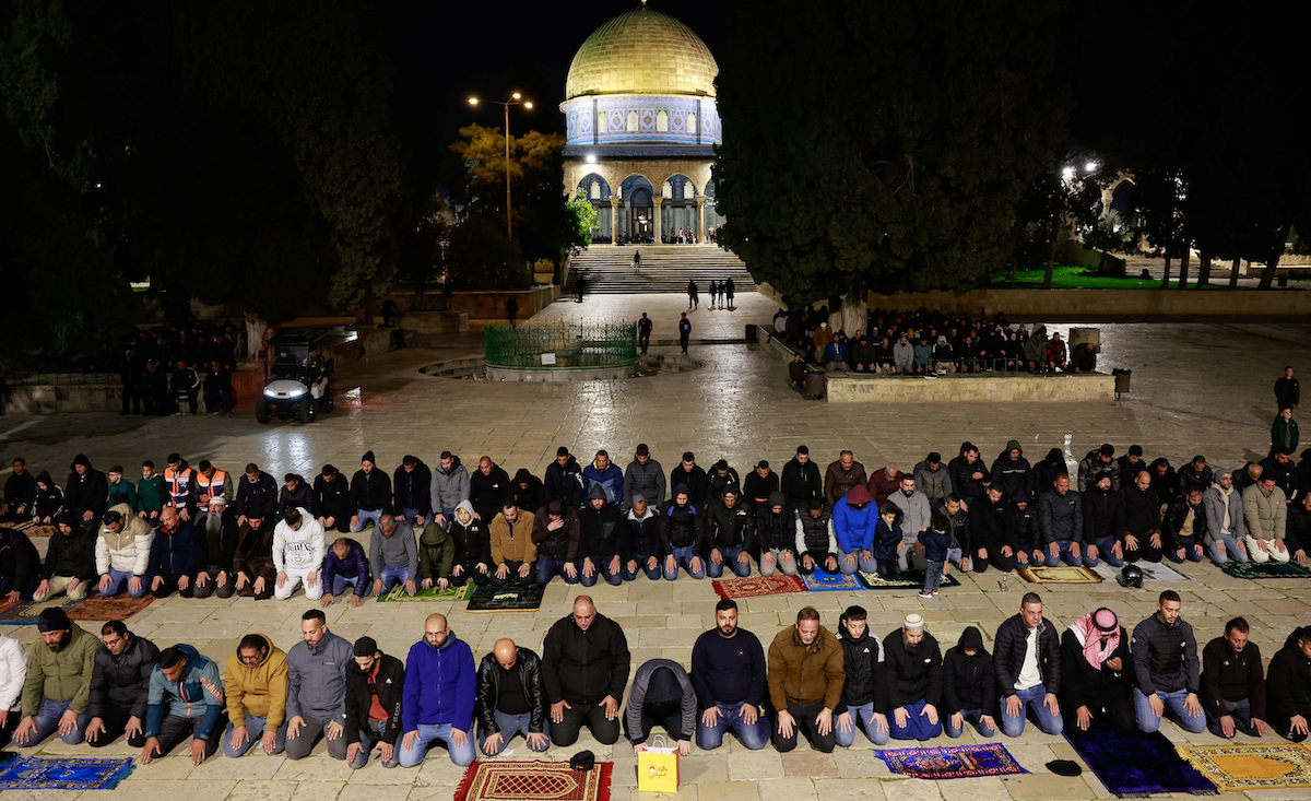 ​Muslim worshippers take part in the evening 'Tarawih' prayers during of the Muslim holy month of Ramadan, at the Al-Aqsa compound, known to Jews as Temple Mount, in Jerusalem on March 10, 2024. 