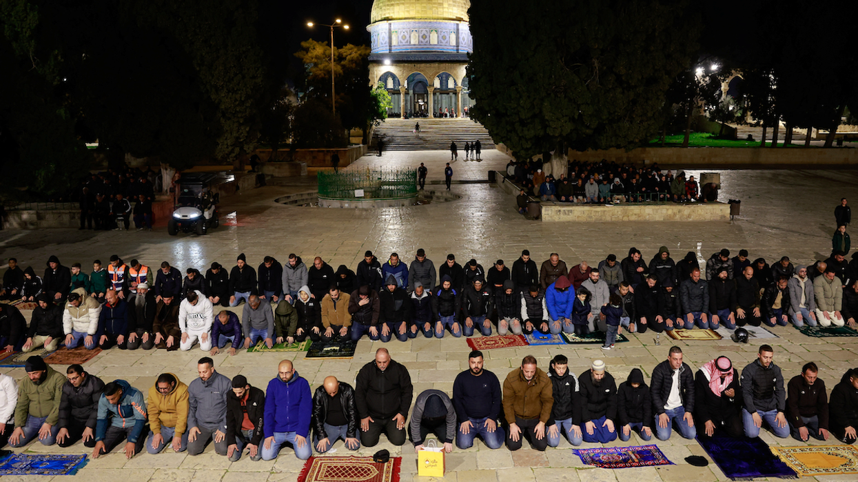 Muslim worshippers take part in the evening 'Tarawih' prayers during of the Muslim holy month of Ramadan, at the Al-Aqsa compound, known to Jews as Temple Mount, in Jerusalem on March 10, 2024.