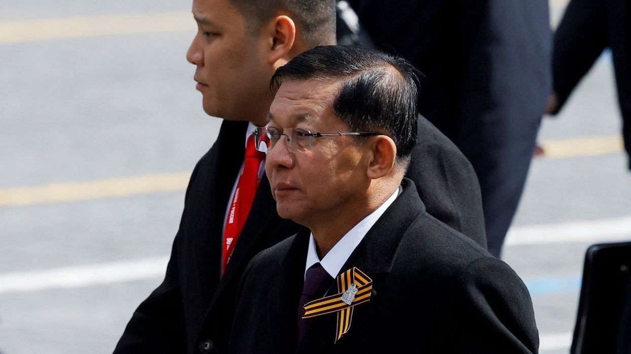 Myanmar's military chief Senior General Min Aung Hlaing leaves after a military parade on Victory Day, marking the 80th anniversary of the victory over Nazi Germany in World War Two, in Red Square in central Moscow, Russia, May 9, 2025.