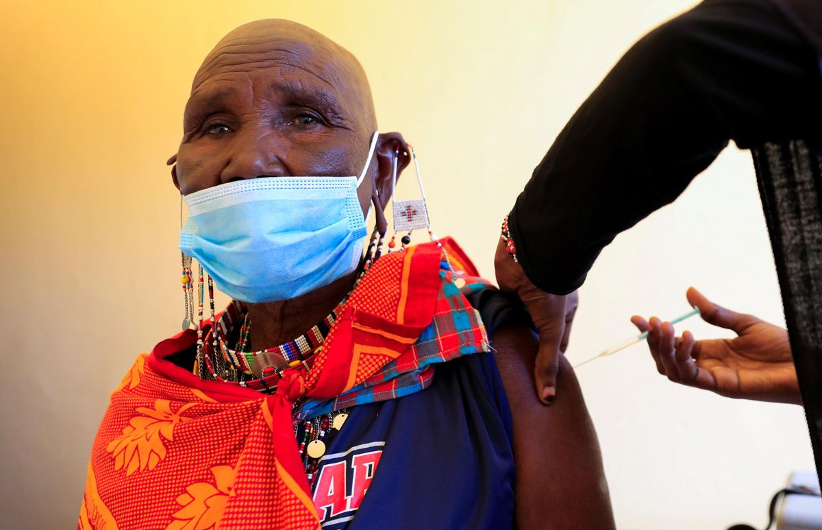 Nandoiye Ole Yiele, 74, receives her first dose of the coronavirus disease (COVID-19) vaccine at the Bissil Health Centre within Iibissil settlement, Matapato North of Kajiado county, Kenya August 23, 2021