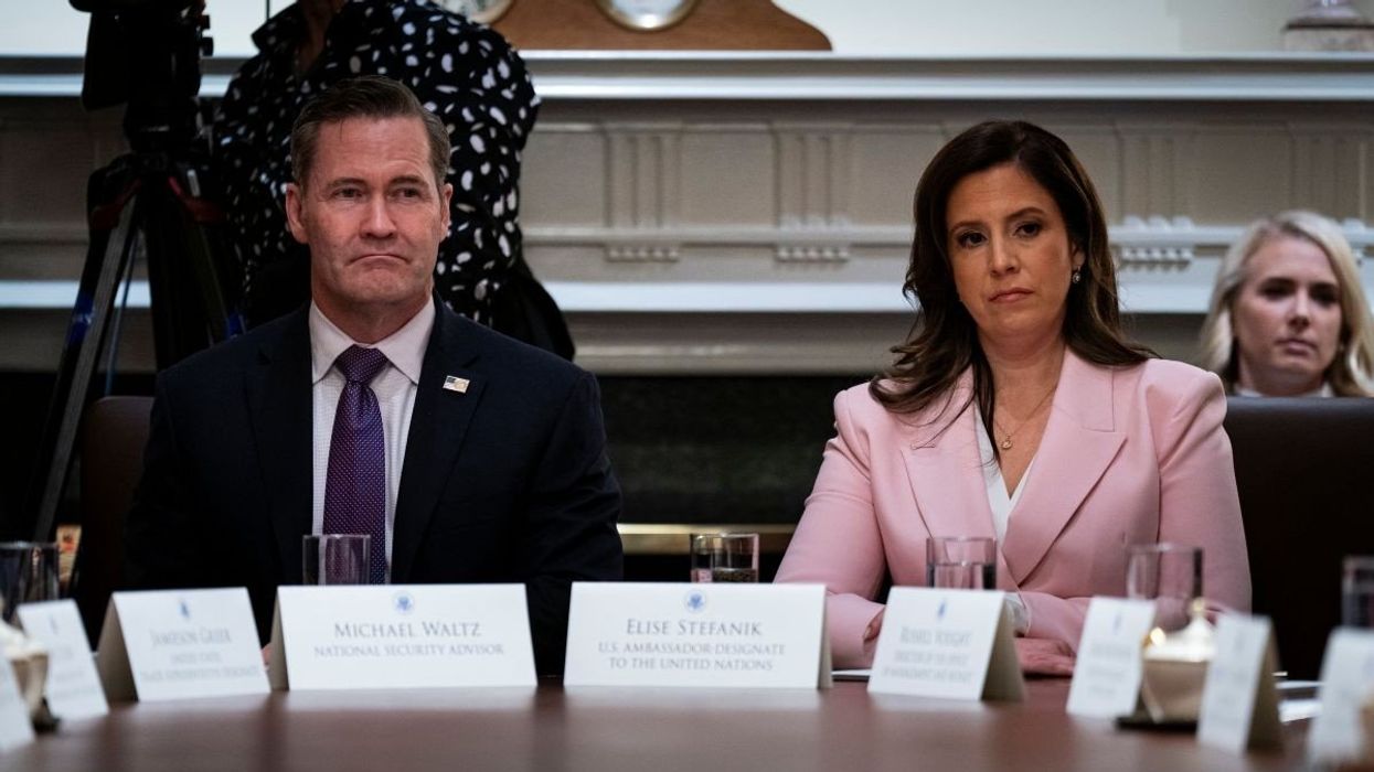 National Security Advisor Mike Waltz and Rep. Elise Stefanik (R-NY), the then-nominee for US ambassador to the UN, during a Cabinet meeting at the White House in Washington, DC, on Wednesday, Feb. 26, 2025.