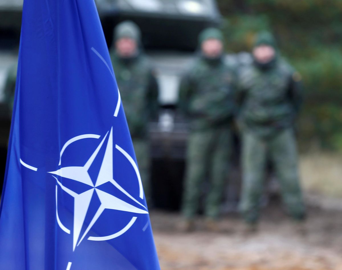 NATO flag is seen during NATO enhanced Forward Presence battle group military exercise Silver Arrow in Adazi, Latvia October 5, 201