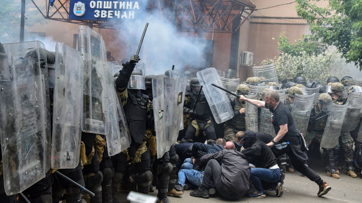 NATO Kosovo Force soldiers clash with local Kosovo Serb protesters