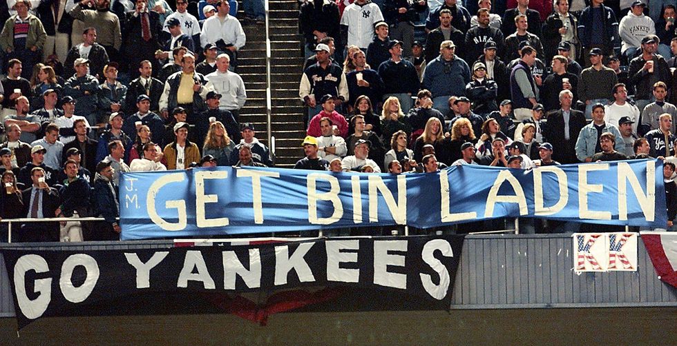 New York Yankee fans hold up an anti-Osama bin Laden sign during a game against the Oakland Athletics on Oct. 10, 2001.