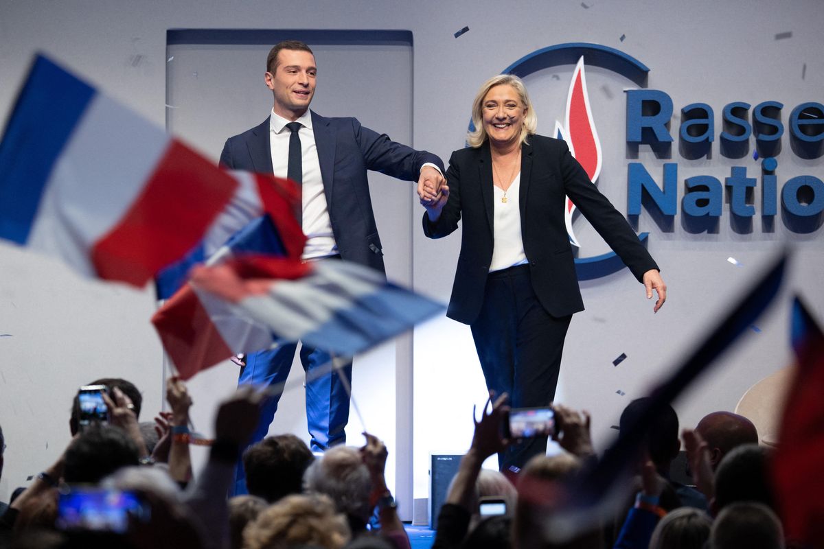 Newly elected National Rally leader Jordan Bardella with the outgoing Marine Le Pen during the party congress in Paris.