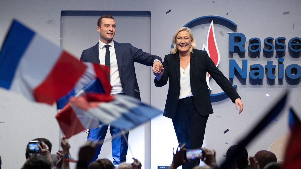 Newly elected National Rally leader Jordan Bardella with the outgoing Marine Le Pen during the party congress in Paris.