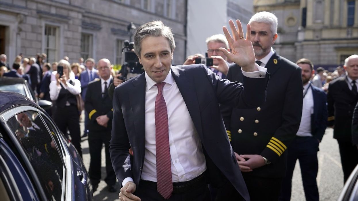 Newly elected Prime Minister Simon Harris leaves the Dail, in Dublin, following the vote by Irish parliamentarians to elect him, making him the youngest taoiseach in Ireland's history.