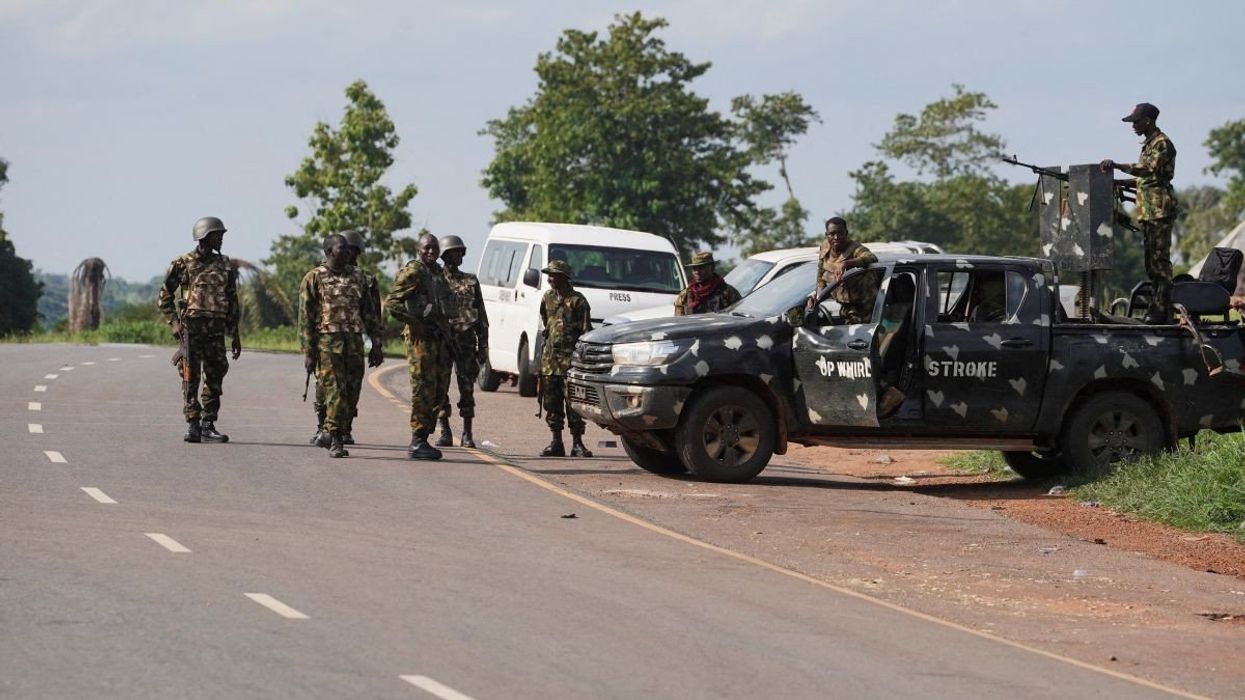 Nigerian Army soldiers on patrol after a deadly gunmen attack in Yelwata, Benue State, Nigeria, on June 16, 2025.