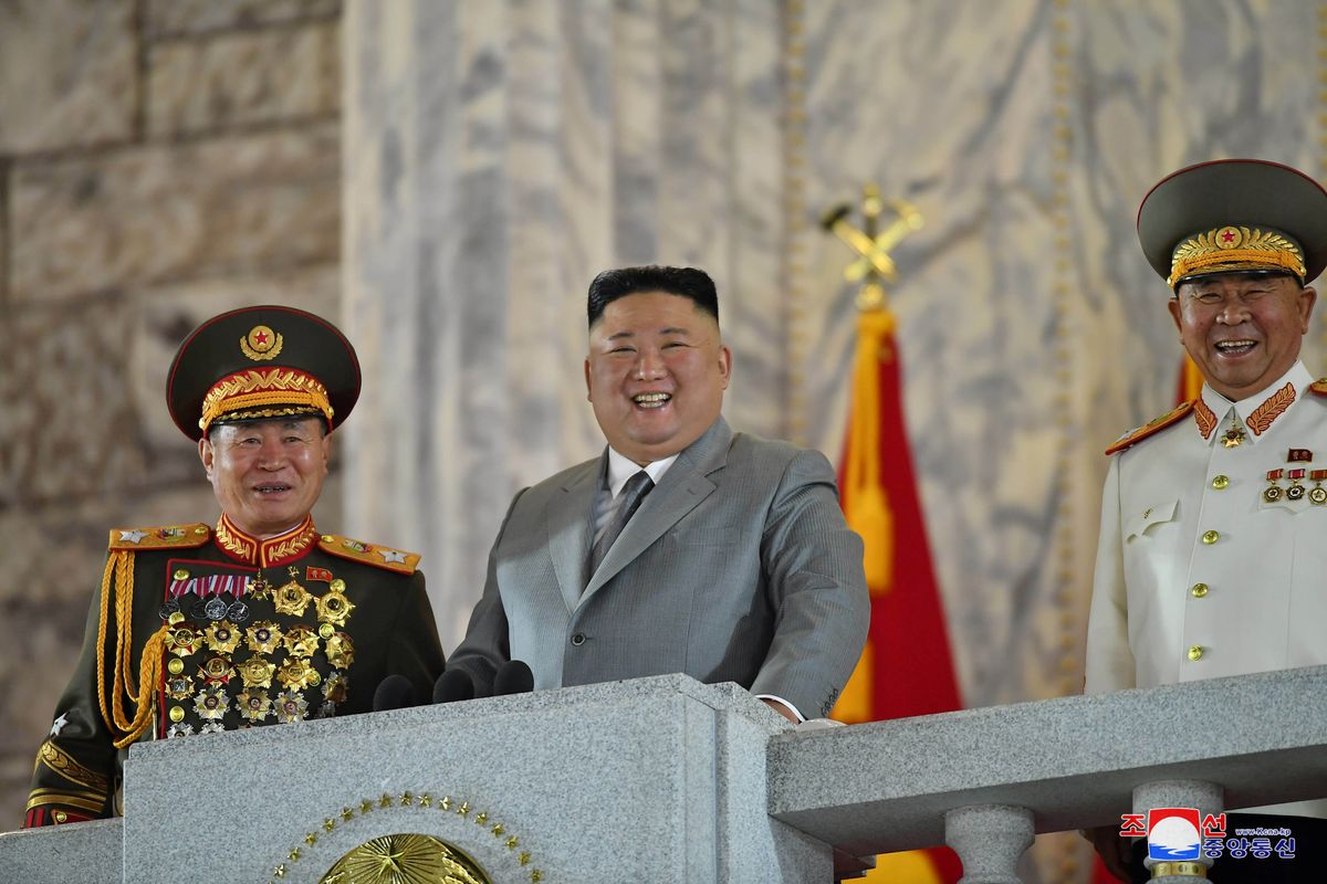 North Korean leader Kim Jong Un reacts as he attends a parade to mark the 75th anniversary of the founding of the ruling Workers' Party of Korea