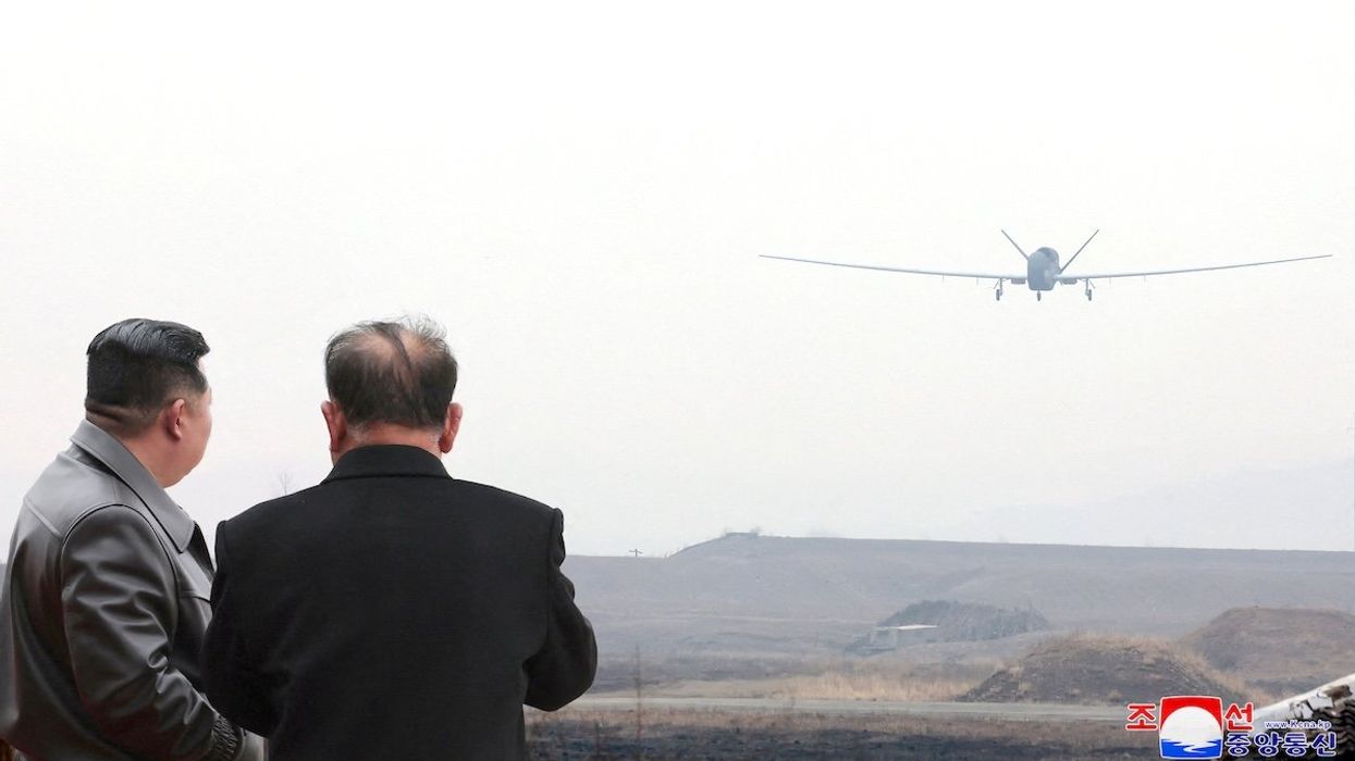 North Korean leader Kim Jong Un supervises the test of suicide drones with artificial intelligence at an unknown location, in this photo released by North Korea's official Korean Central News Agency on March 27, 2025.