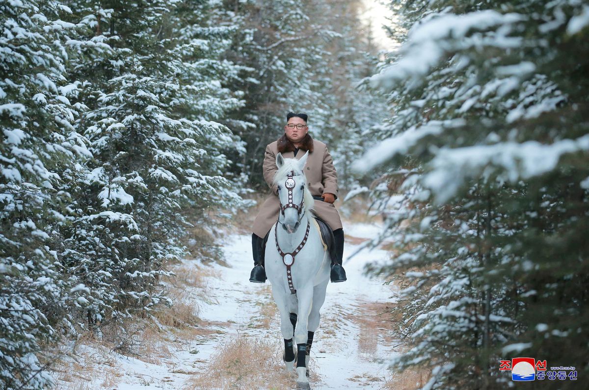 North Korean Supreme Leader Kim Jong Un rides a horse during snowfall in Mt. Paektu. 