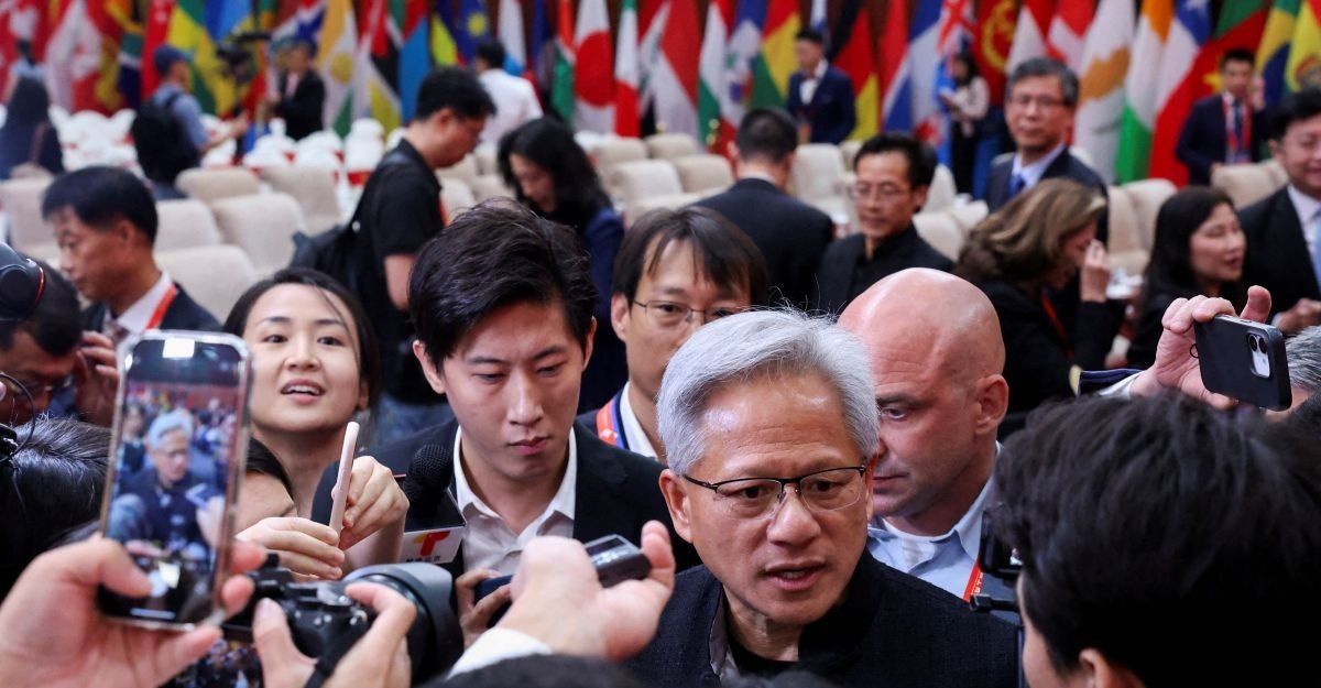 ​Nvidia CEO Jensen Huang speaks to media members after the opening ceremony for the China International Supply Chain Expo in Beijing, China July 16, 2025. 
