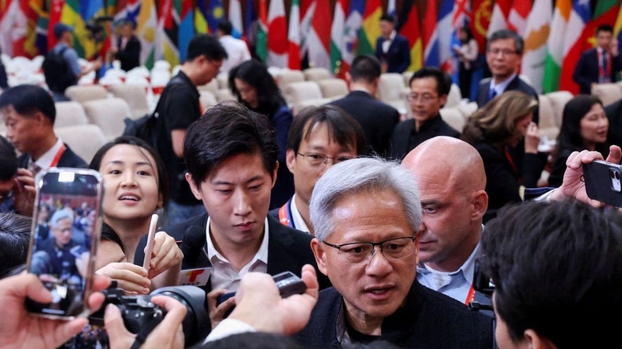 Nvidia CEO Jensen Huang speaks to media members after the opening ceremony for the China International Supply Chain Expo in Beijing, China July 16, 2025.