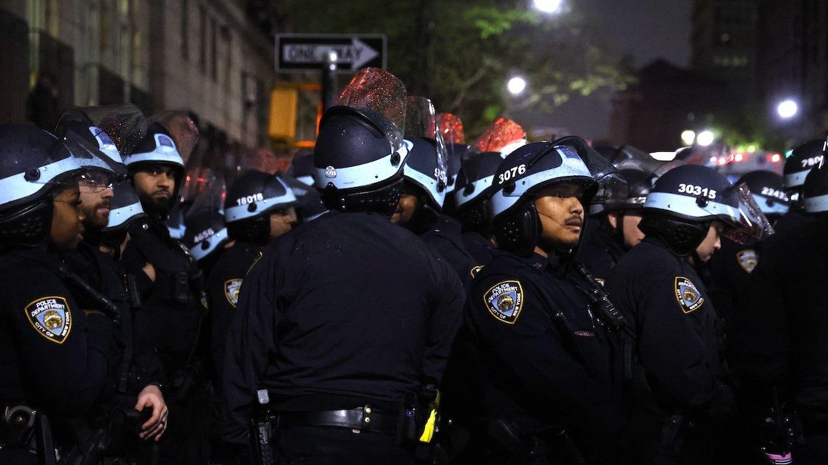 ​NYPD officers arrive at Columbia University on April 30, 2024, to clear demonstrators from an occupied hall on campus. 