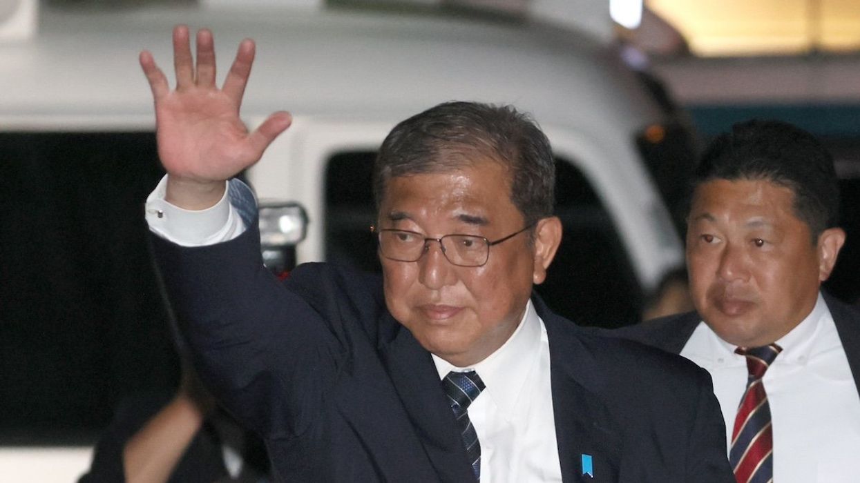 October 23, 2024, Kamagaya, Japan - Japanese Prime Minister and leader of the ruling Liberal Democratic Party (LDP) Shigeru Ishiba reacts to his supporters after he delivered a campaign speech for his party candidate Hisashi Matsumoto for the general election at Kamagaya in Chiba prefecture, suburban Tokyo on Wednesday, October 23, 2024.