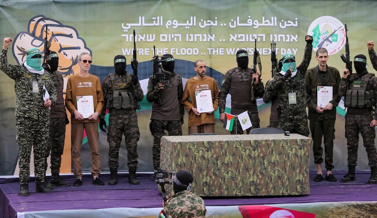 ​Or Levy, Eli Sharabi, and Ohad Ben Ami, hostages held in Gaza since the deadly Oct. 7, 2023 attack, are released by Hamas militants as part of a ceasefire and a hostages-prisoners swap deal between Hamas and Israel on Feb. 8, 2025. 