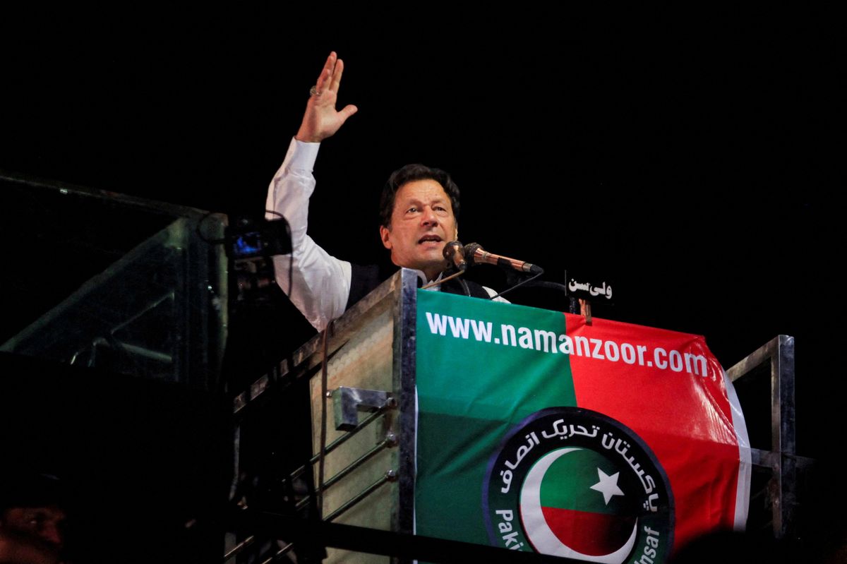 Ousted Pakistani PM Imran Khan gestures as he addresses supporters during a rally in Lahore.