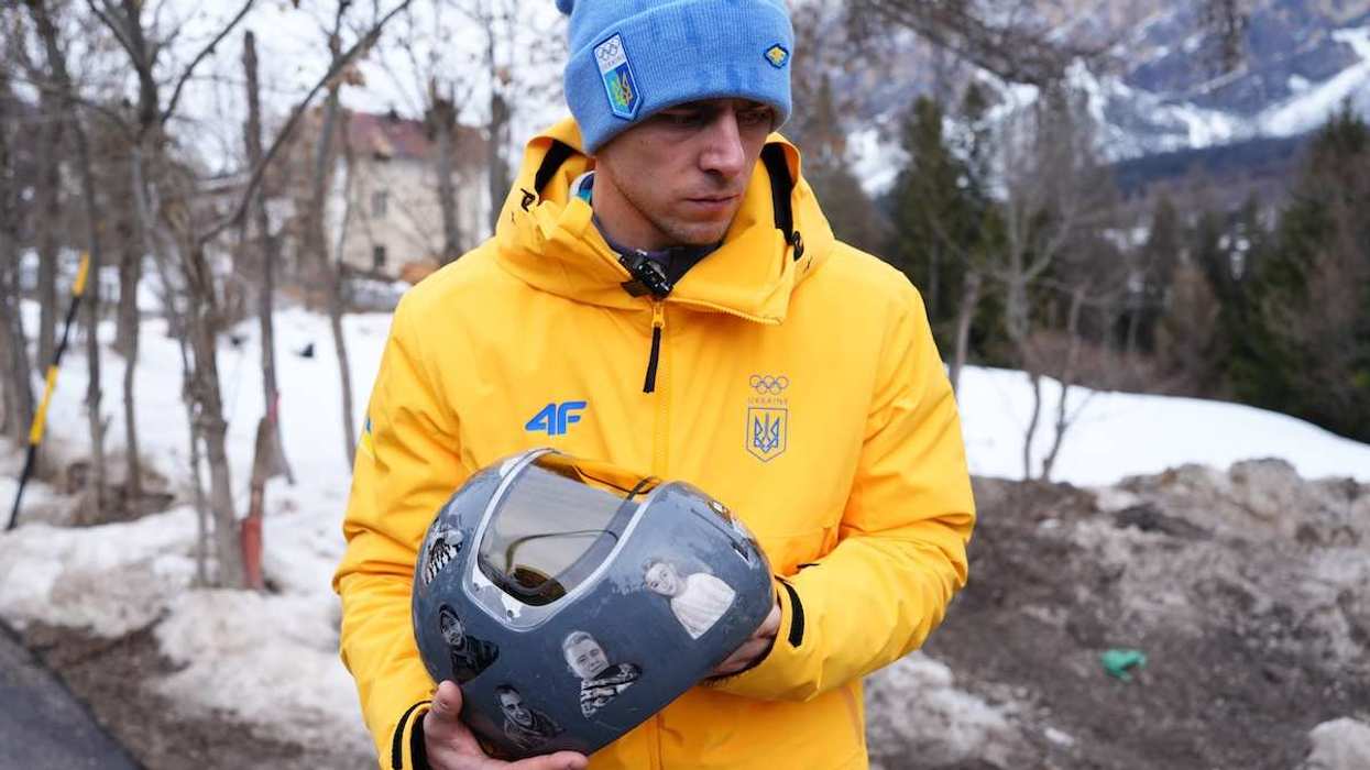 PA via Reuters Ukraine's Vladyslav Heraskevych, with his helmet, which features pictures of people killed in the war with Russia. Heraskevych was ruled out of the Men's Skeleton event by the International Olympic Committee just over an hour before competition began, pictured at the Cortina Sliding Centre, on day six of the Milano Cortina 2026 Winter Olympics, Italy. Picture date: Thursday February 12, 2026.