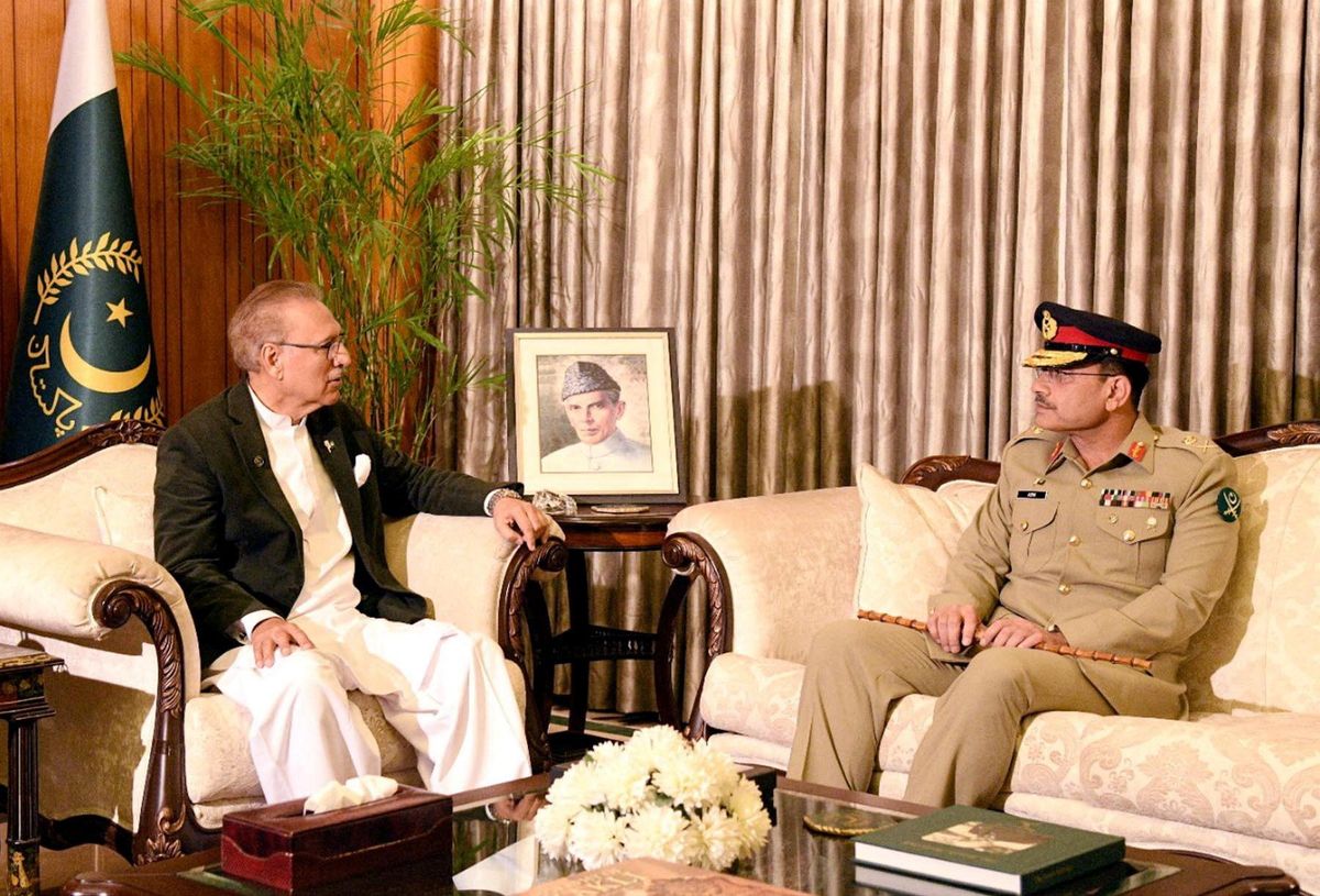 Pakistan's new army chief Gen. Asim Munir meets with President Arif Alvi in Islamabad.