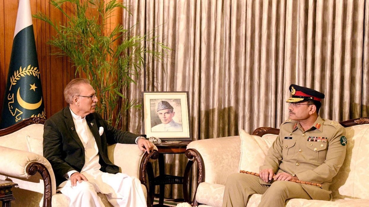 Pakistan's new army chief Gen. Asim Munir meets with President Arif Alvi in Islamabad.
