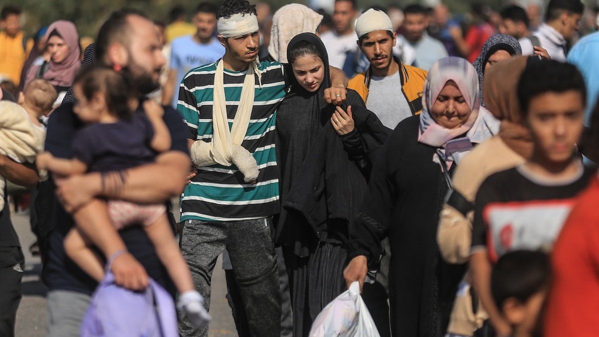Palestinians families flee Gaza City and other parts of northern Gaza towards the southern areas amid ongoing battles between Israel and Hamas.